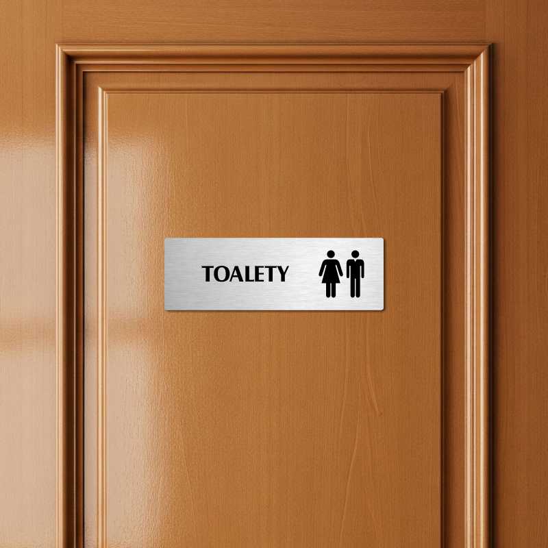 Toalety společné, stříbrná popiska na dveře